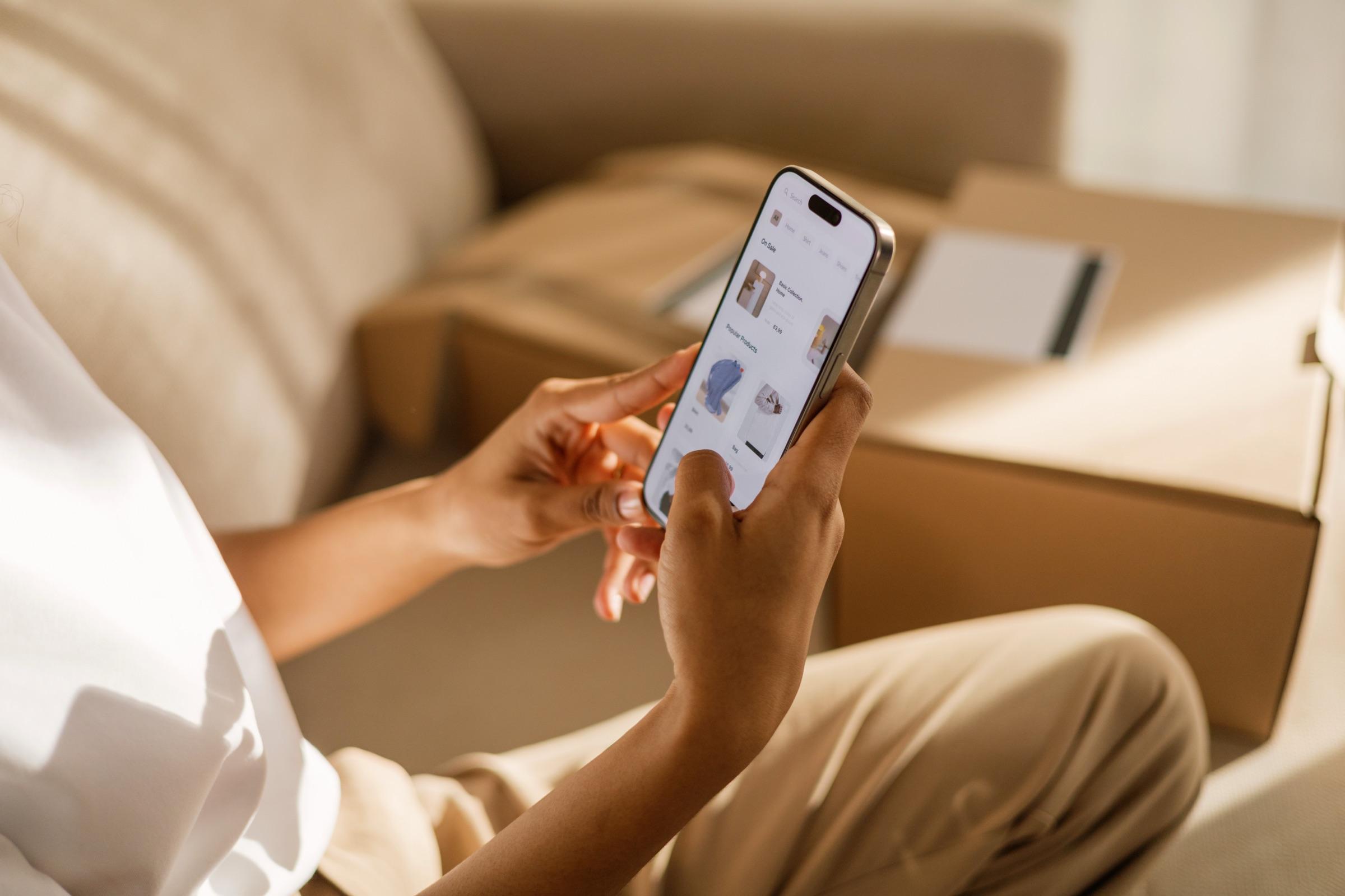 Shopper browsing a store on their phone at home