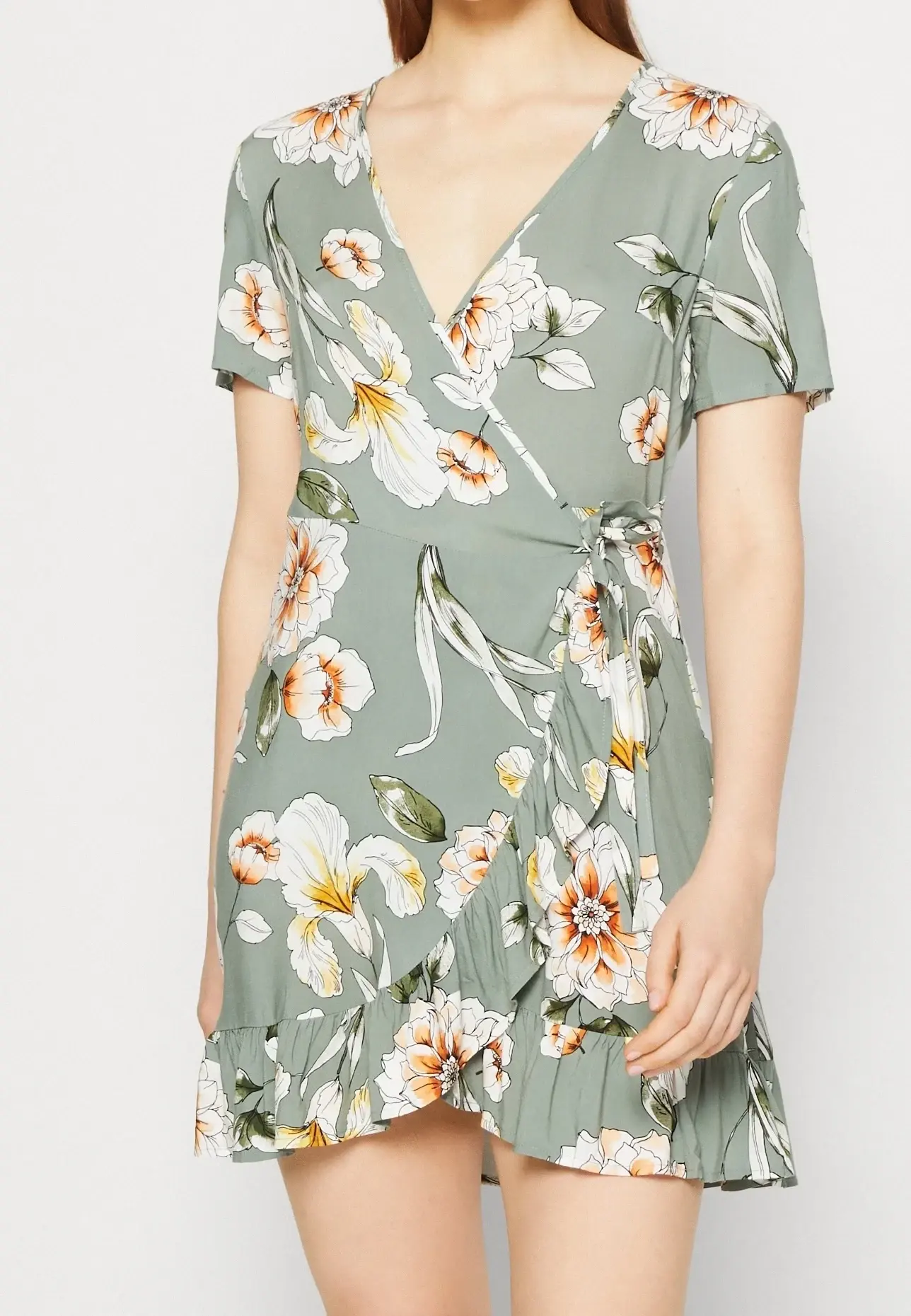 The sage Floral Wrap Dress, as photographed for your catalog.